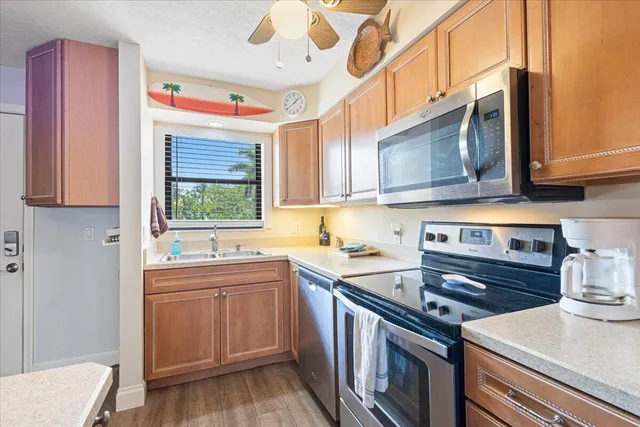 a bathroom with a toilet sink and shower