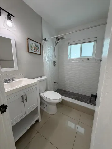 a view of walk in closet with an empty space