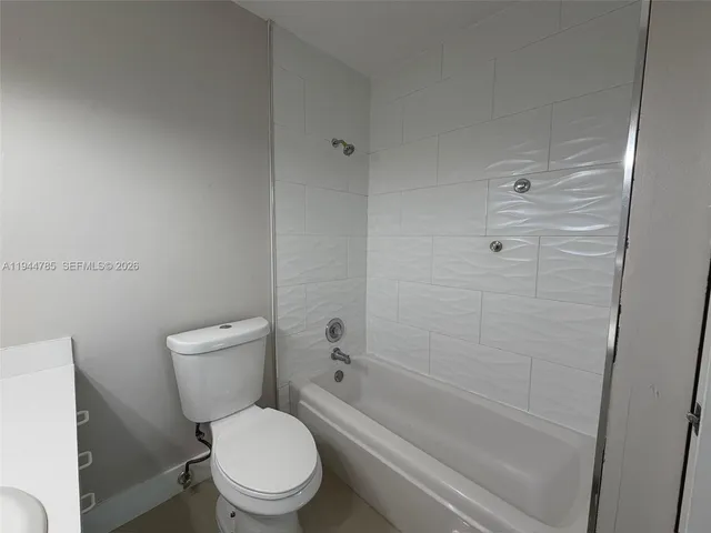 a view of a backyard of the house