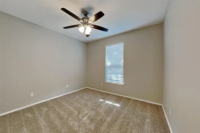a bathroom with a sink vanity and a mirror
