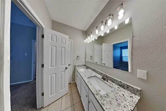 a bathroom with a toilet and a bathtub