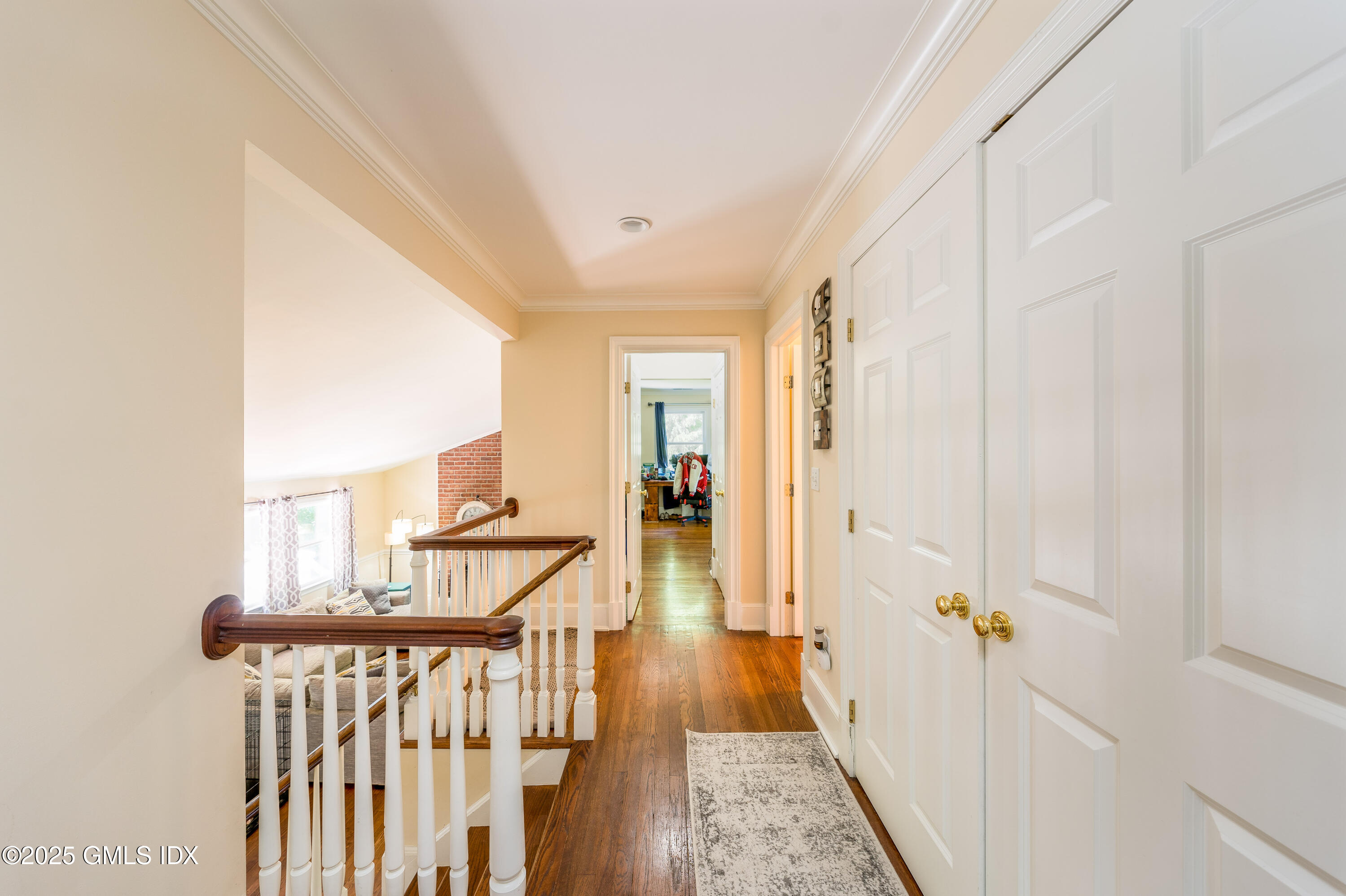 176 Valley Road Cos Cob, CT 06807 - Photo 14 of 27 a view of a hallway with wooden floor and entryway