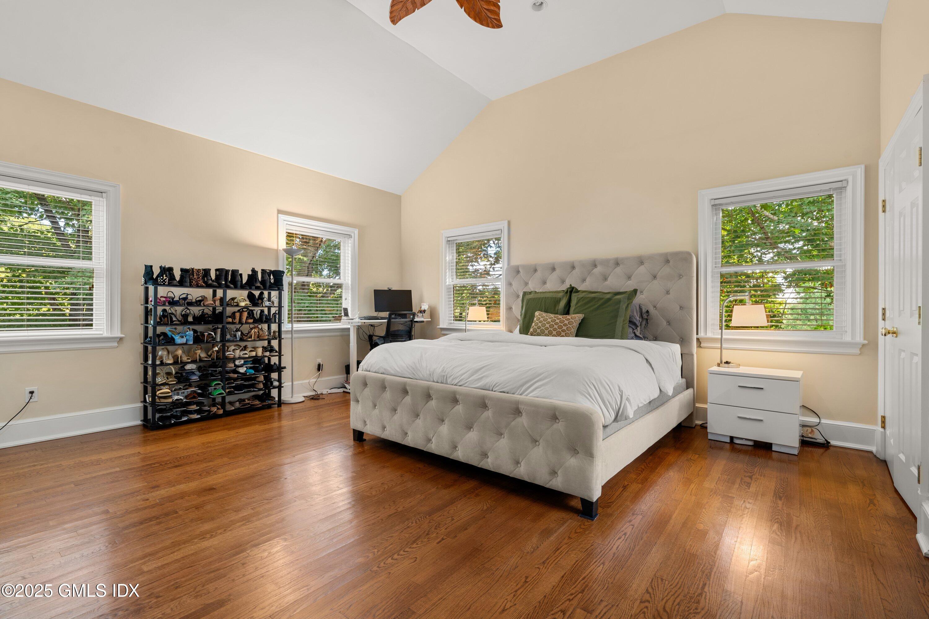 176 Valley Road Cos Cob, CT 06807 - Photo 16 of 27 a bed sitting in a spacious bedroom next to a window