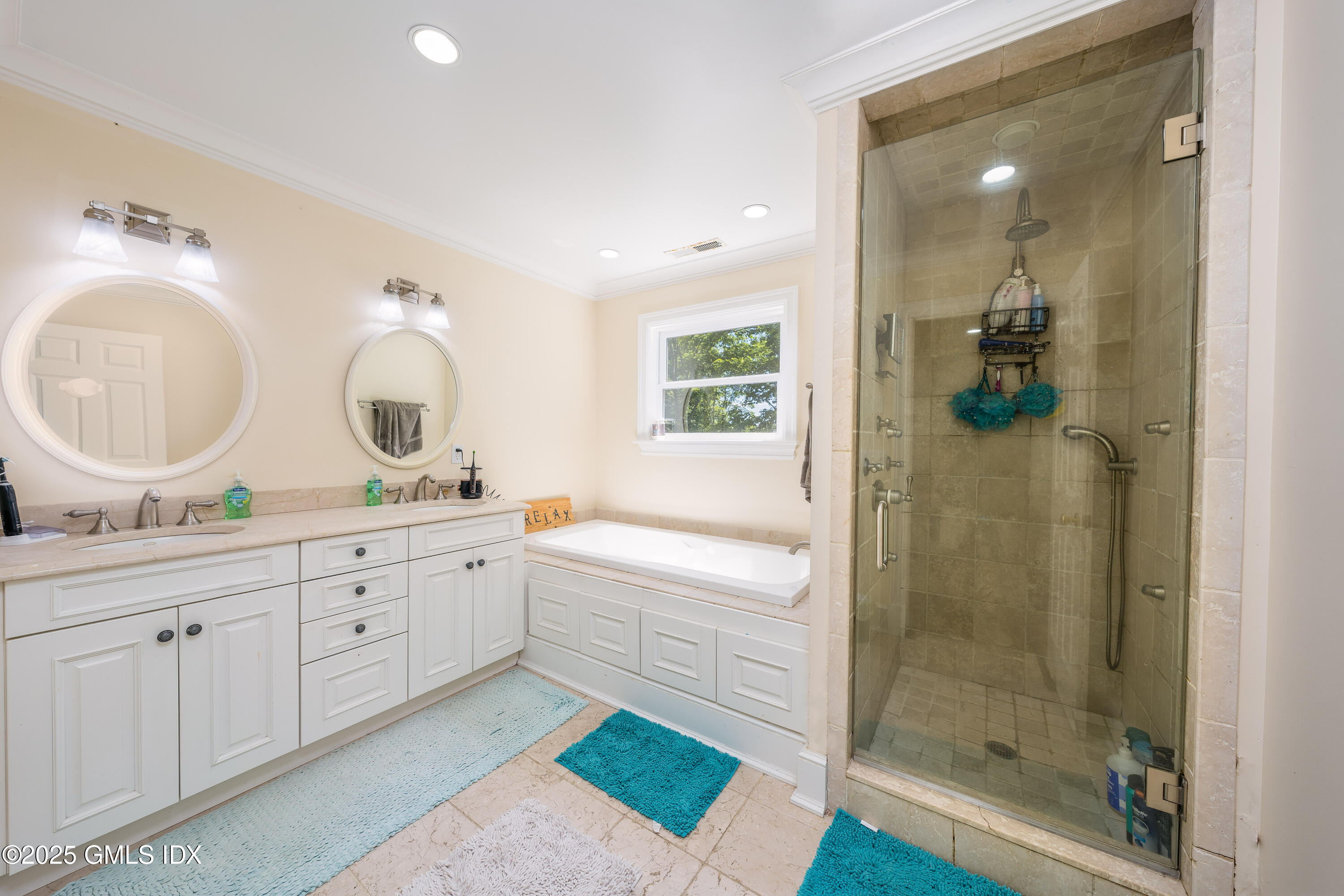 176 Valley Road Cos Cob, CT 06807 - Photo 19 of 27 a bathroom with a double vanity sink mirror and bathtub