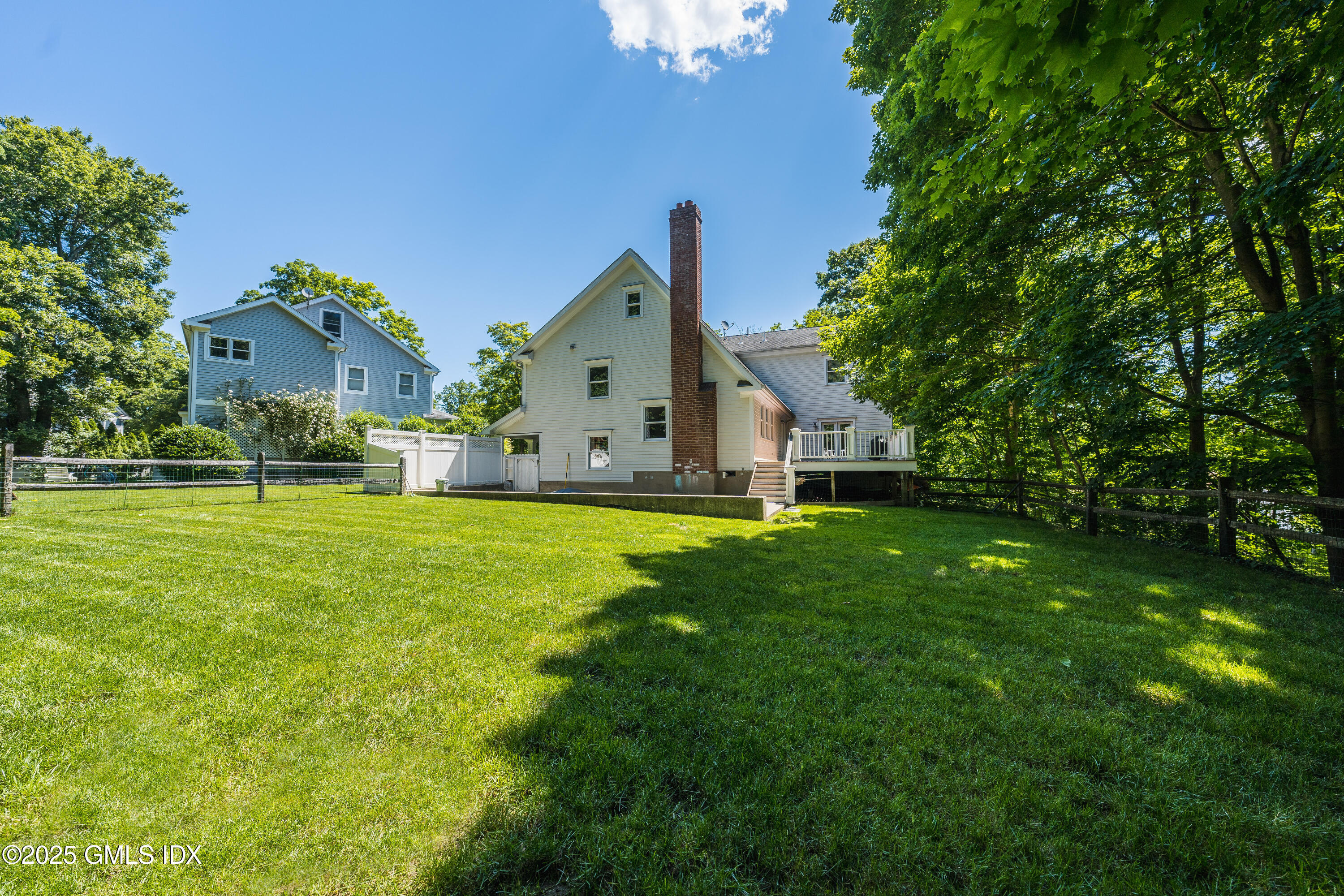 176 Valley Road Cos Cob, CT 06807 - Photo 27 of 27 a front view of a house with garden