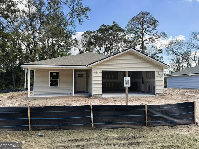 a view of house with outdoor space