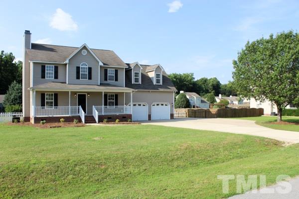 1504 Harvey Johnson Road Raleigh, NC 27603 - Photo 3 of 22 a front view of house with yard