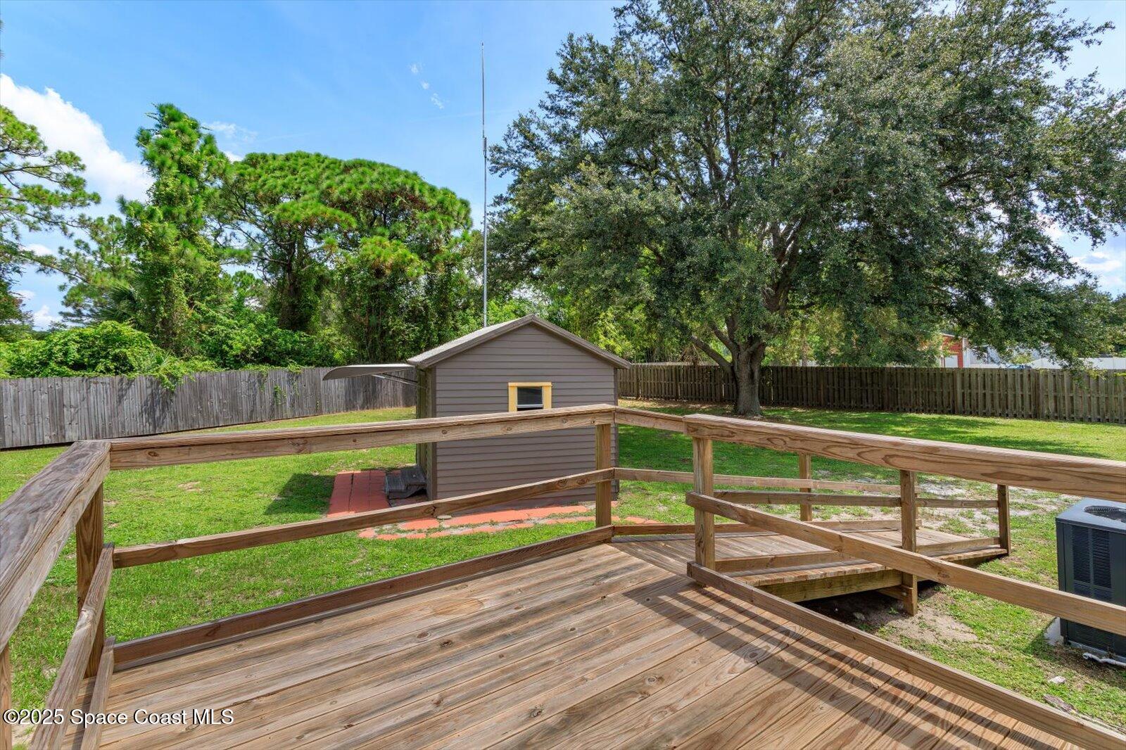 616 Camp Road Cocoa, FL 32927 - Photo 21 of 25 a view of house with a yard