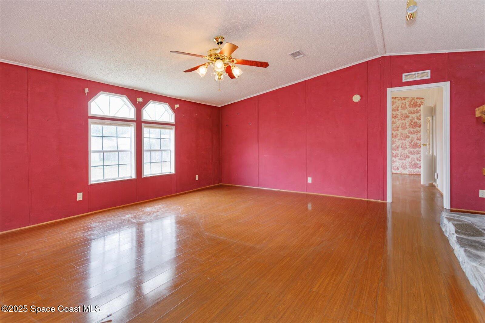 616 Camp Road Cocoa, FL 32927 - Photo 3 of 25 a view of an empty room with a window