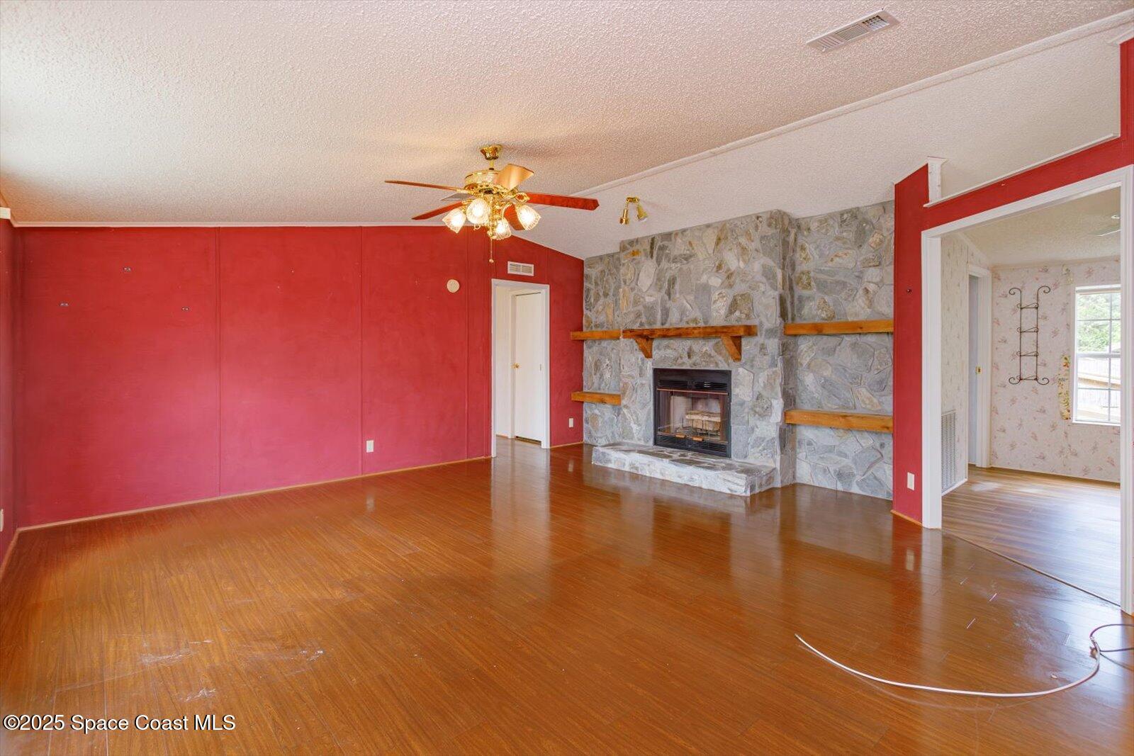 616 Camp Road Cocoa, FL 32927 - Photo 4 of 25 a view of a livingroom with a fireplace