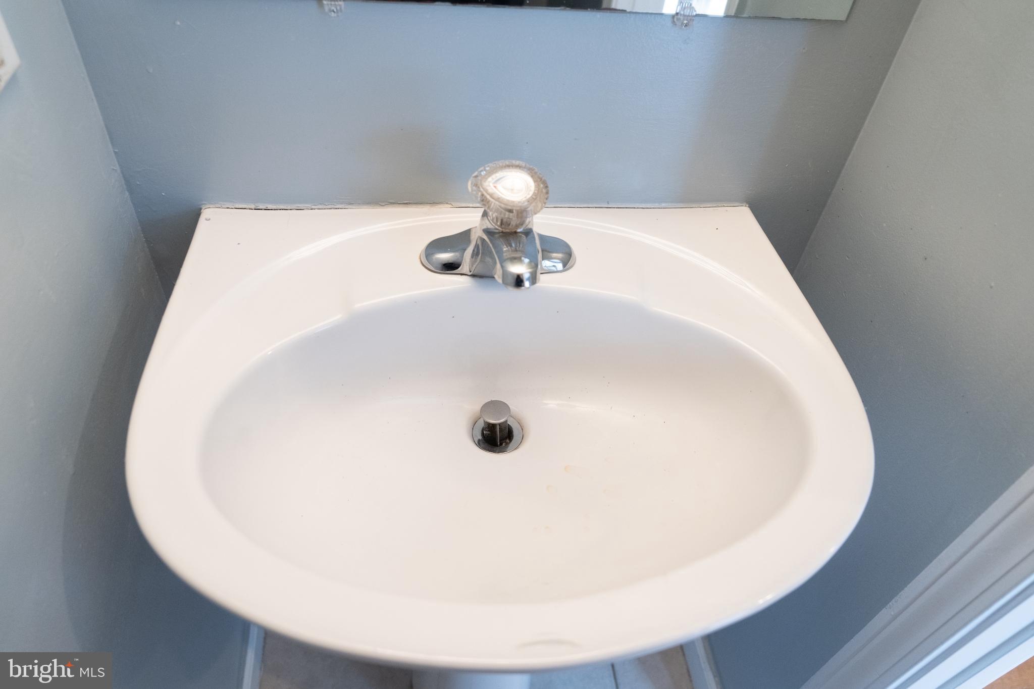 3731 Greenmount Avenue Baltimore, MD 21218 - Photo 11 of 23 a close view of a sink in a bathroom