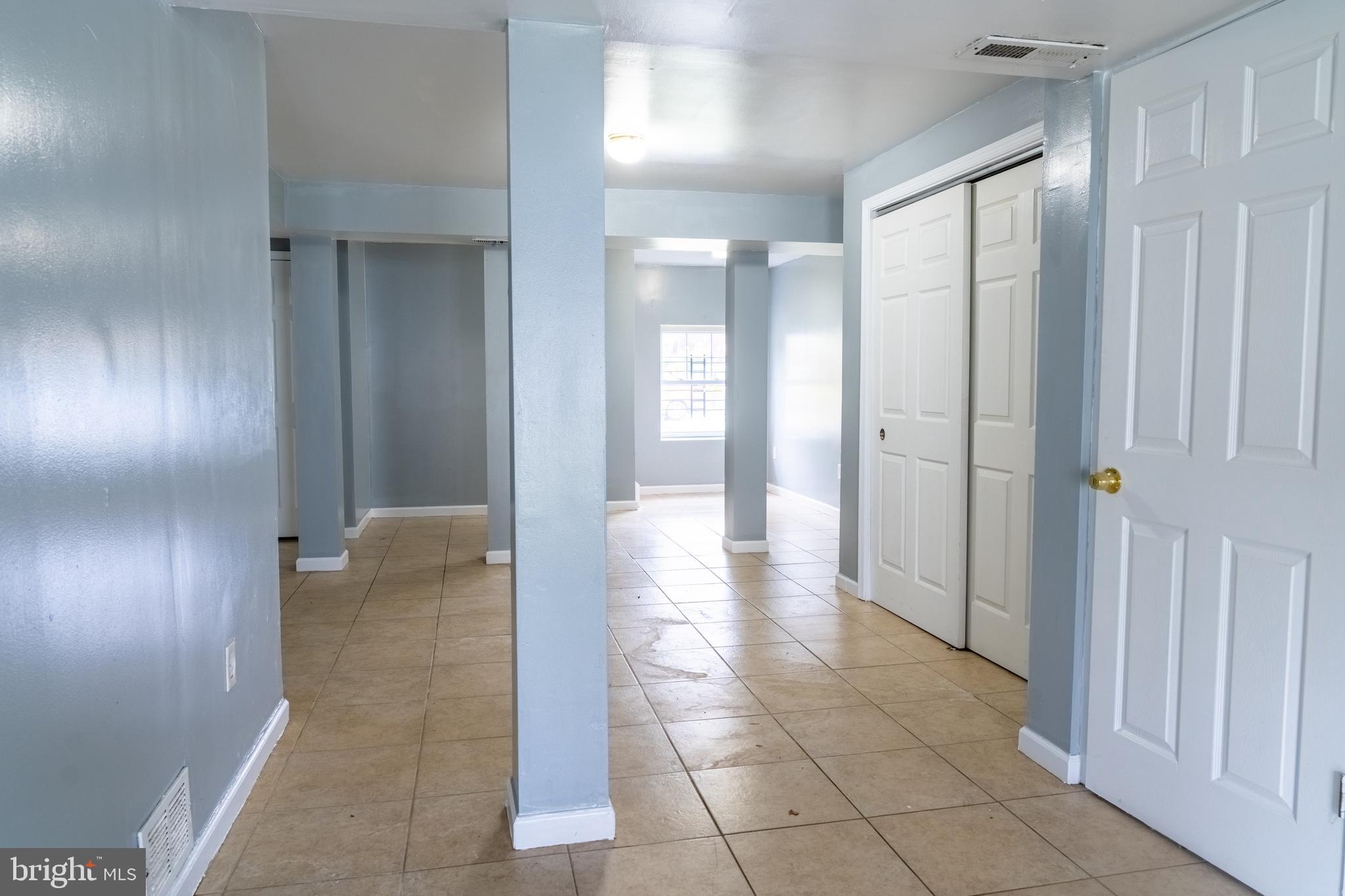 3731 Greenmount Avenue Baltimore, MD 21218 - Photo 13 of 23 a view of a hallway