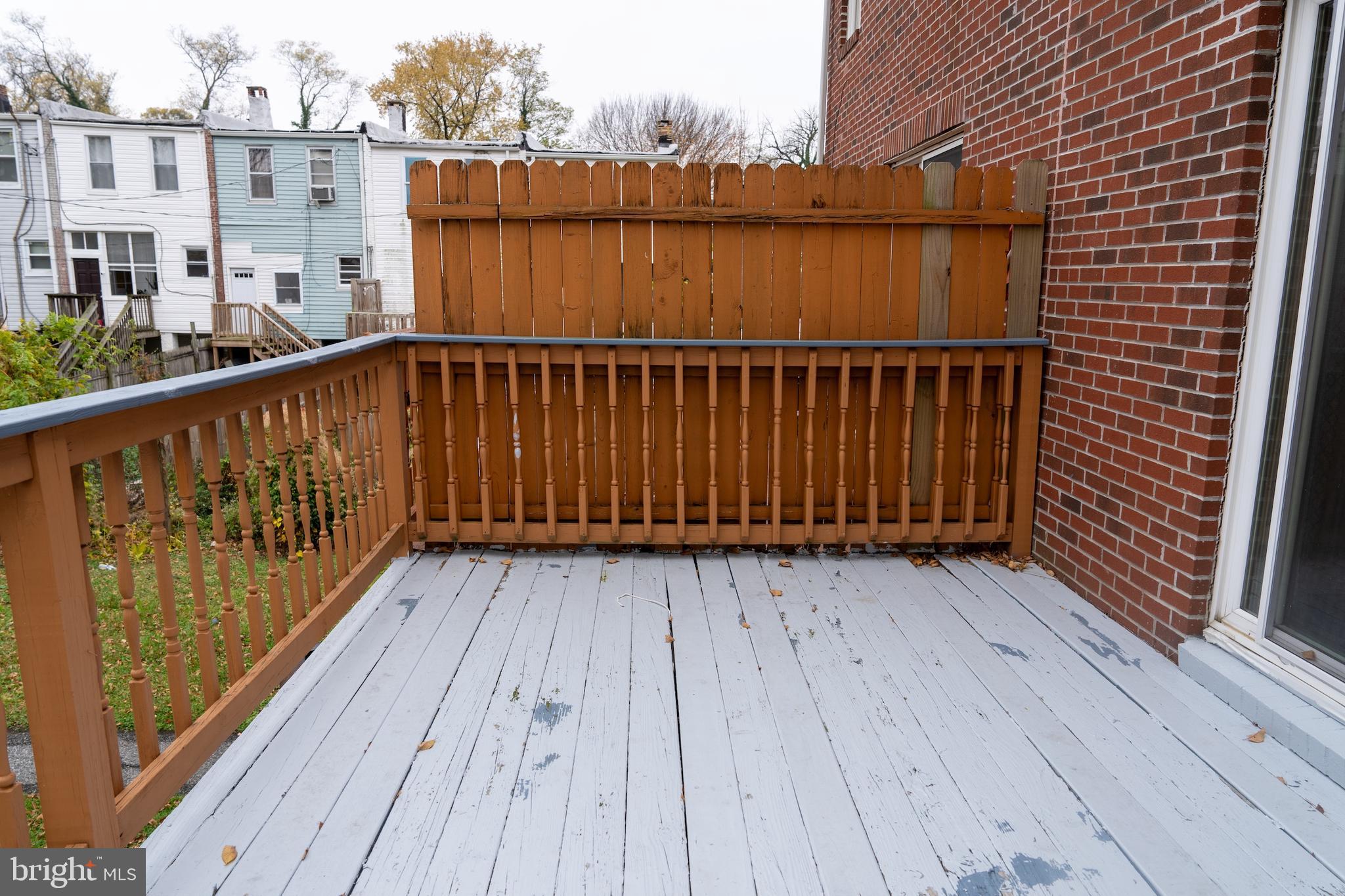 3731 Greenmount Avenue Baltimore, MD 21218 - Photo 19 of 23 a balcony with wooden floor