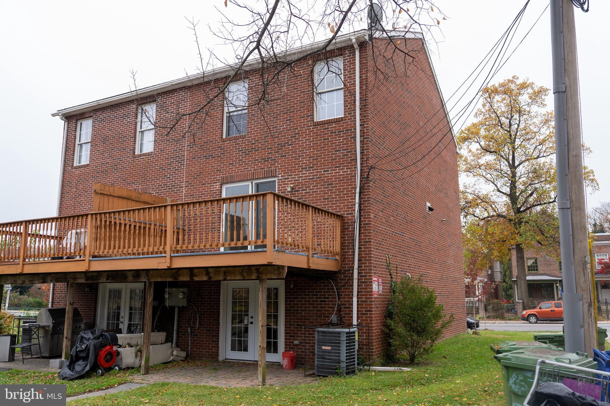 3731 Greenmount Avenue Baltimore, MD 21218 - Photo 22 of 23 a front view of a house with garden