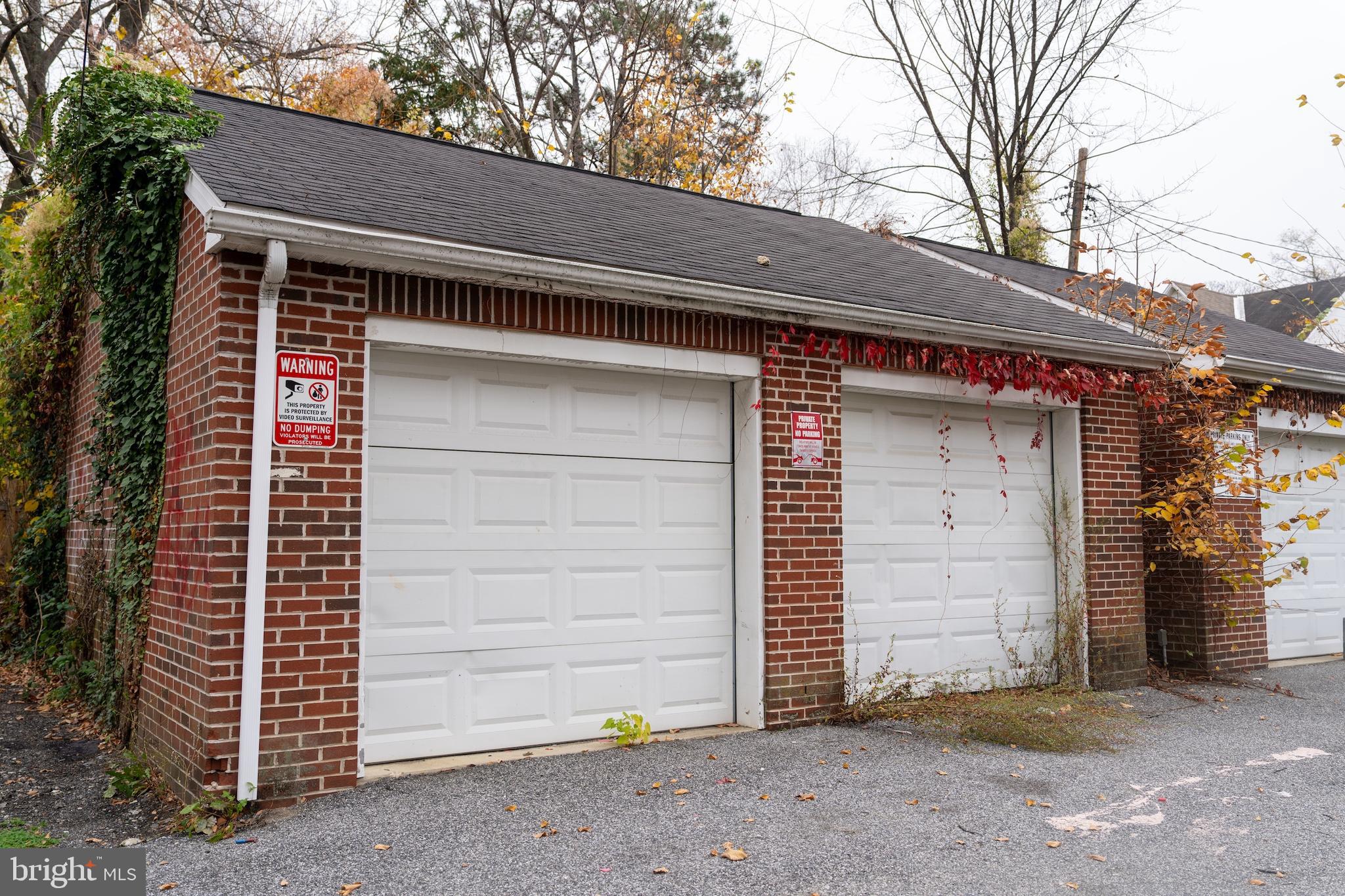 3731 Greenmount Avenue Baltimore, MD 21218 - Photo 23 of 23 a view of a house with a door and wooden walls