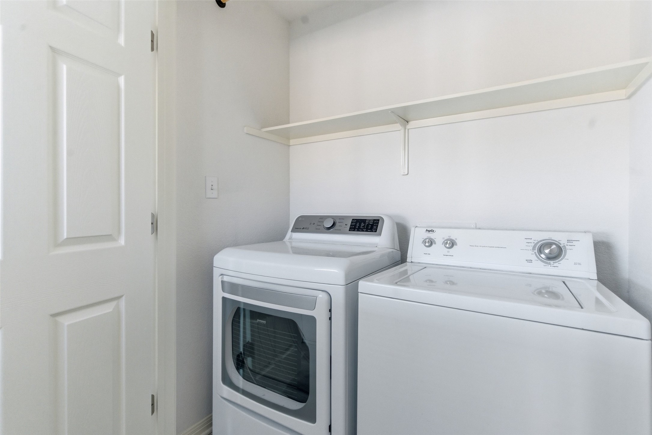 2513 Winchell Lane Austin, TX 78725 - Photo 12 of 23 a utility room with dryer and washer