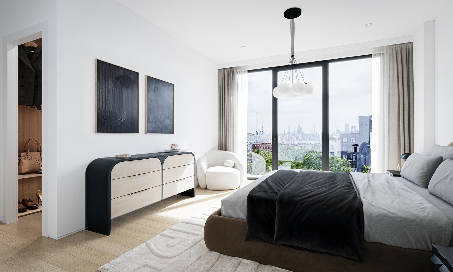 51 South 1st Street, Unit 5 Brooklyn, NY 11249 - Photo 7 of 10 a spacious bedroom with a bed and a large window