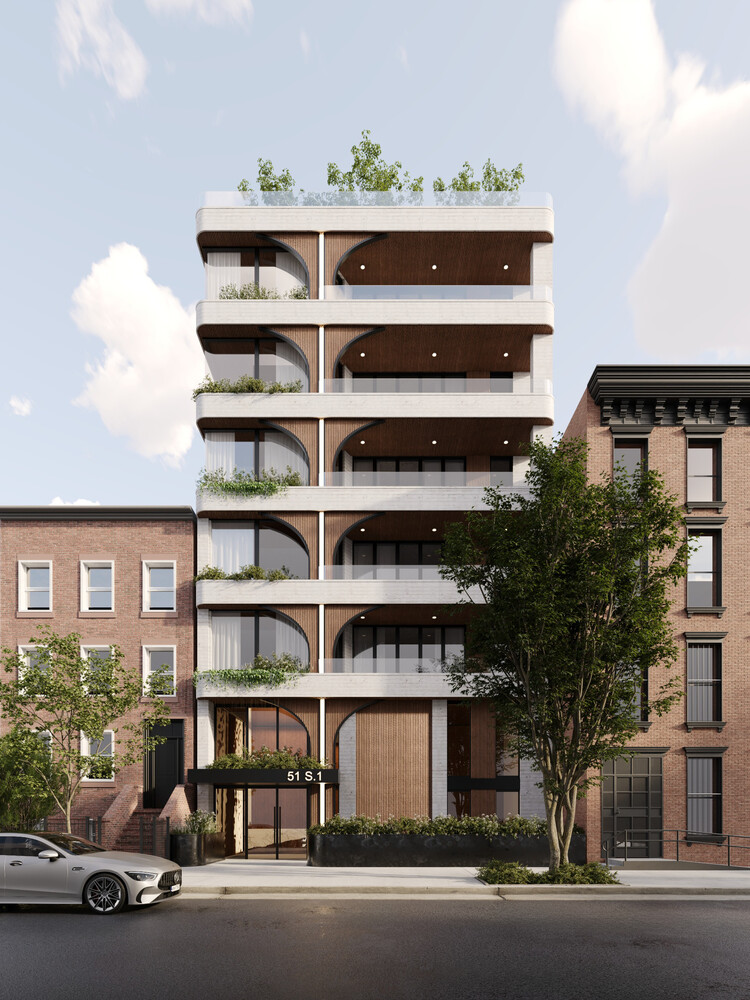 51 South 1st Street, Unit 5 Brooklyn, NY 11249 - Photo 9 of 10 a view of a building with car parked