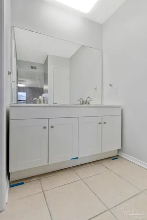 a view of cabinets and window