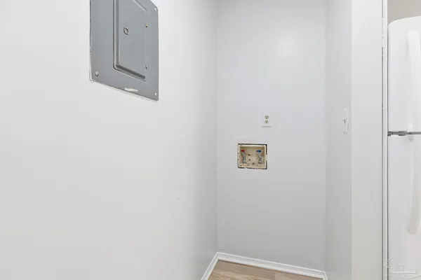 a bathroom with a shower and a window