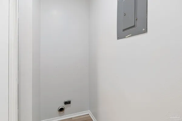 a view of a room with racks on the wall