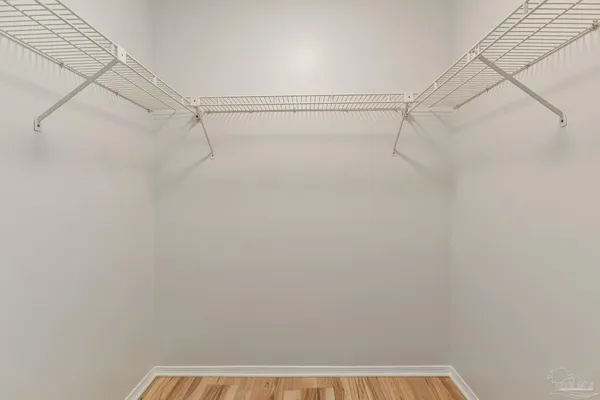 a view of a room with racks on the wall