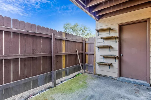 a view of a wooden house with a large window