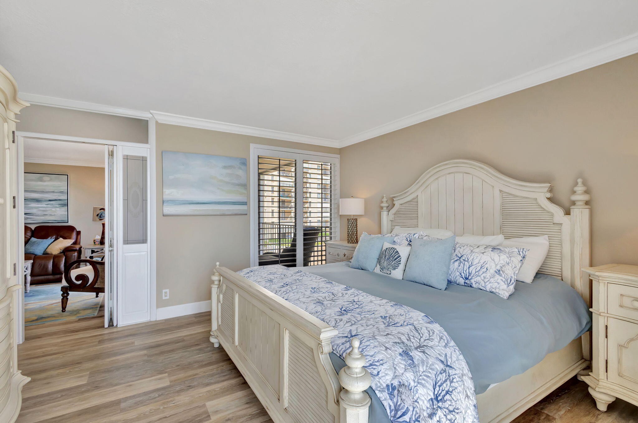 100 Ocean Trail Way, Unit 301 Jupiter, FL 33477 - Photo 32 of 67 a bedroom with a bed and a window