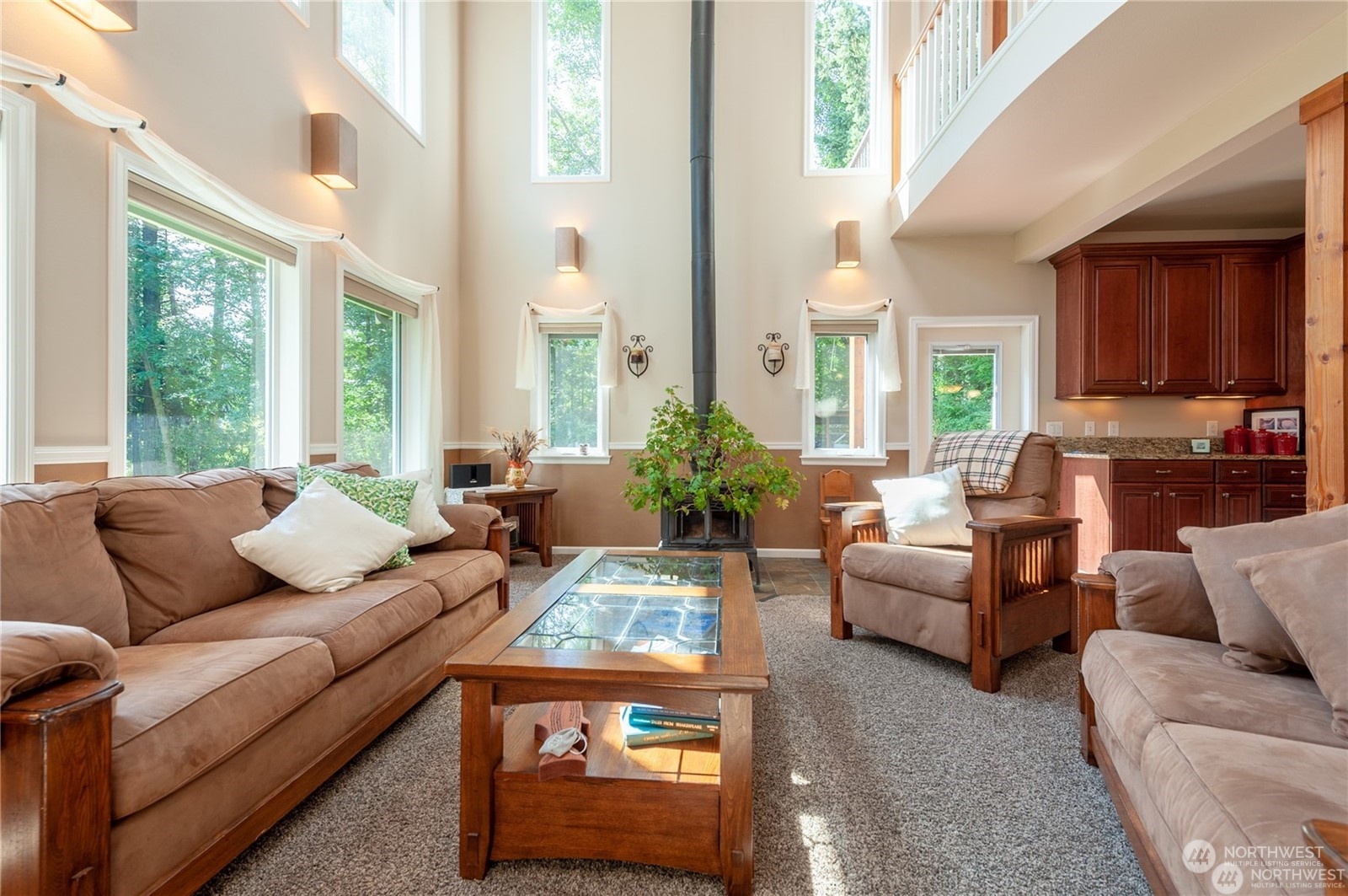 2170 Hilltop Road Lummi Island, WA 98262 - Photo 11 of 31 a living room with furniture fireplace and a large window