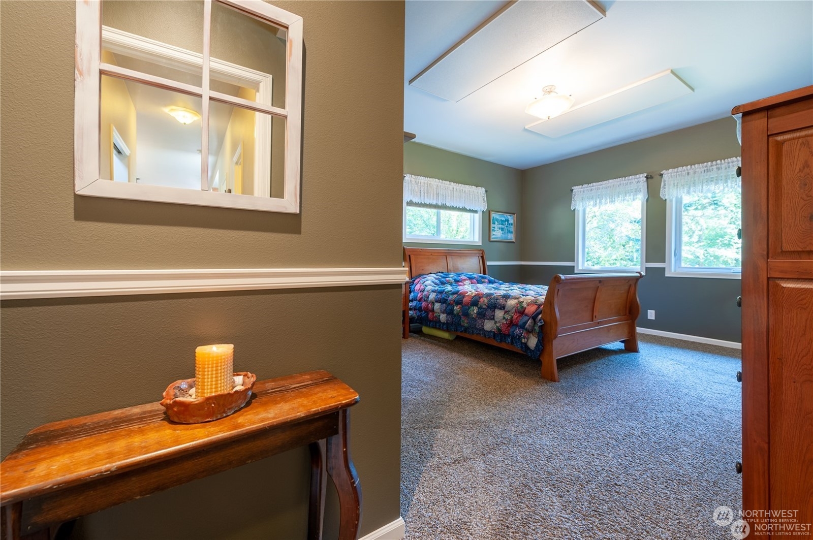 2170 Hilltop Road Lummi Island, WA 98262 - Photo 16 of 31 a bed room with a bed and a window