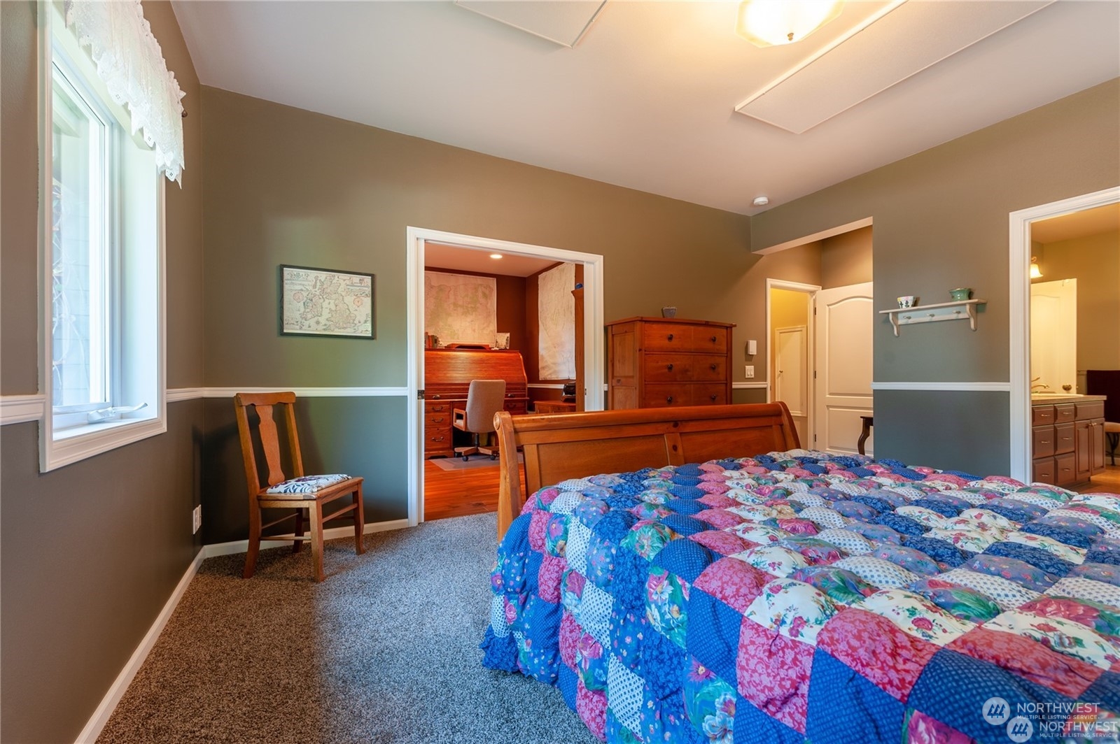 2170 Hilltop Road Lummi Island, WA 98262 - Photo 19 of 31 a bedroom with a bed and furniture