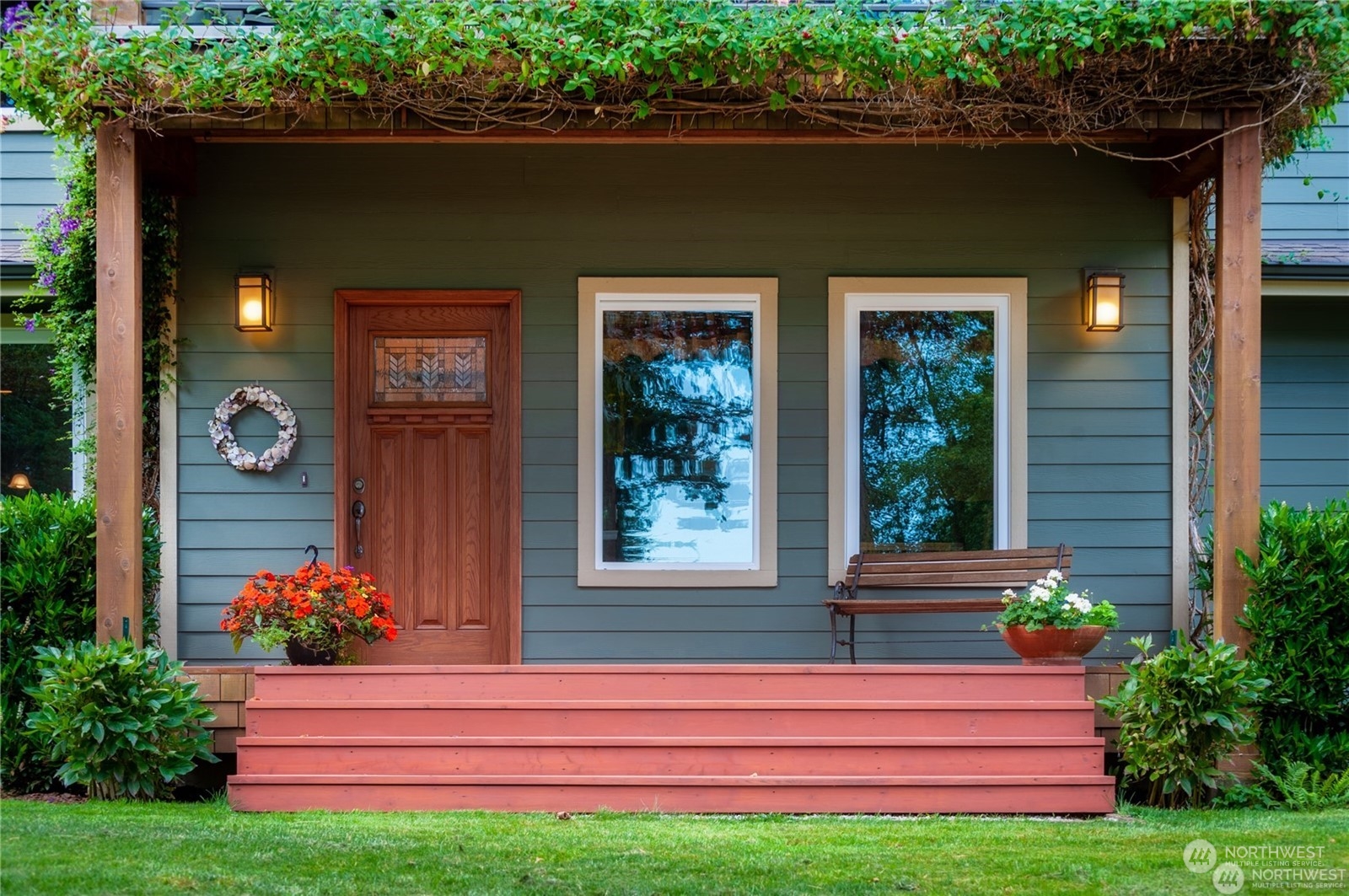 2170 Hilltop Road Lummi Island, WA 98262 - Photo 2 of 31 a front view of a house with garden