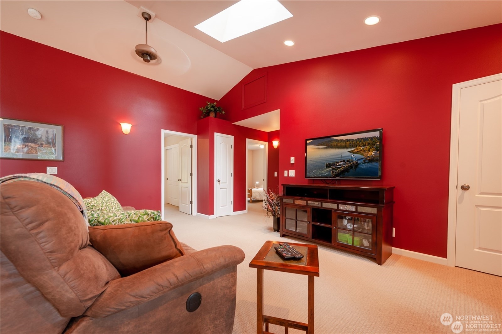 2170 Hilltop Road Lummi Island, WA 98262 - Photo 24 of 31 a living room with furniture and a flat screen tv