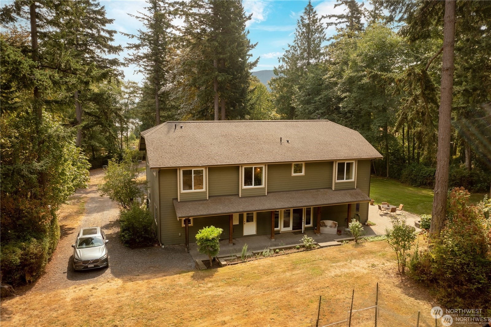 2170 Hilltop Road Lummi Island, WA 98262 - Photo 28 of 31 an aerial view of a house with yard and sitting area
