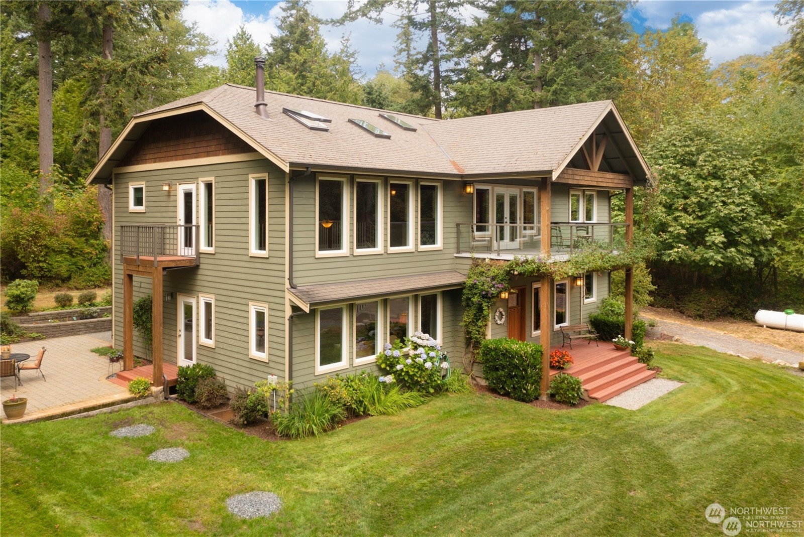 2170 Hilltop Road Lummi Island, WA 98262 - Photo 6 of 31 a aerial view of a house with yard and green space