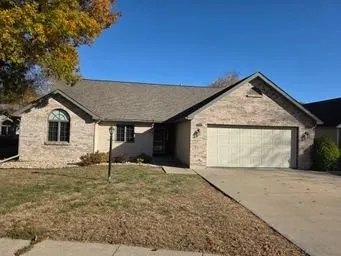 a front view of house with yard