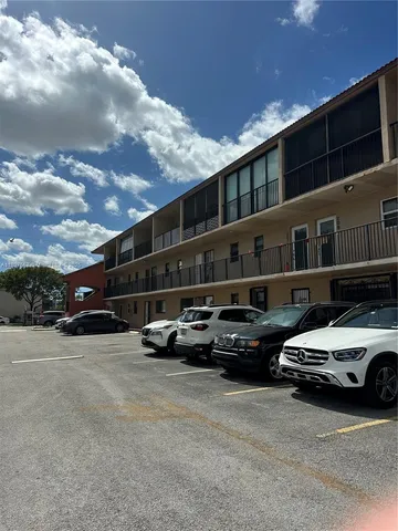 a car parked in front of a building