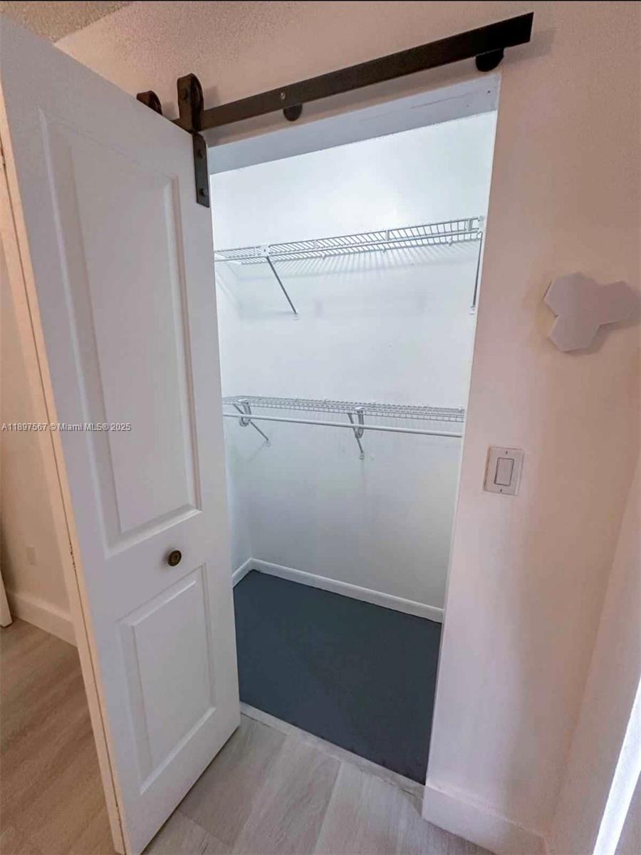 2301 West 60th Street, Unit A211 Hialeah, FL 33016 - Photo 19 of 29 a bathroom with a shower