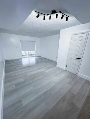 a view of an empty room with window