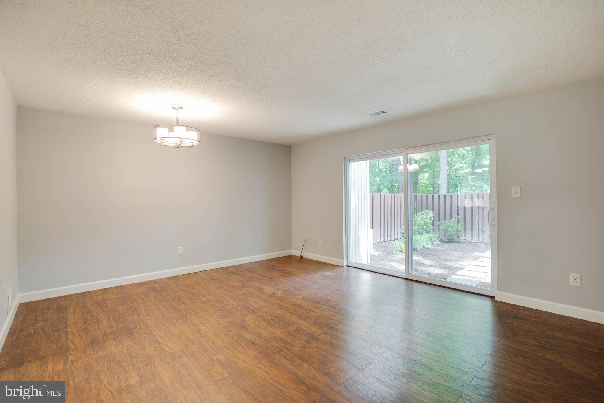 2316 Southgate Square Reston, VA 20191 - Photo 15 of 34 Main Living Area Leading to Enclosed Back Yard