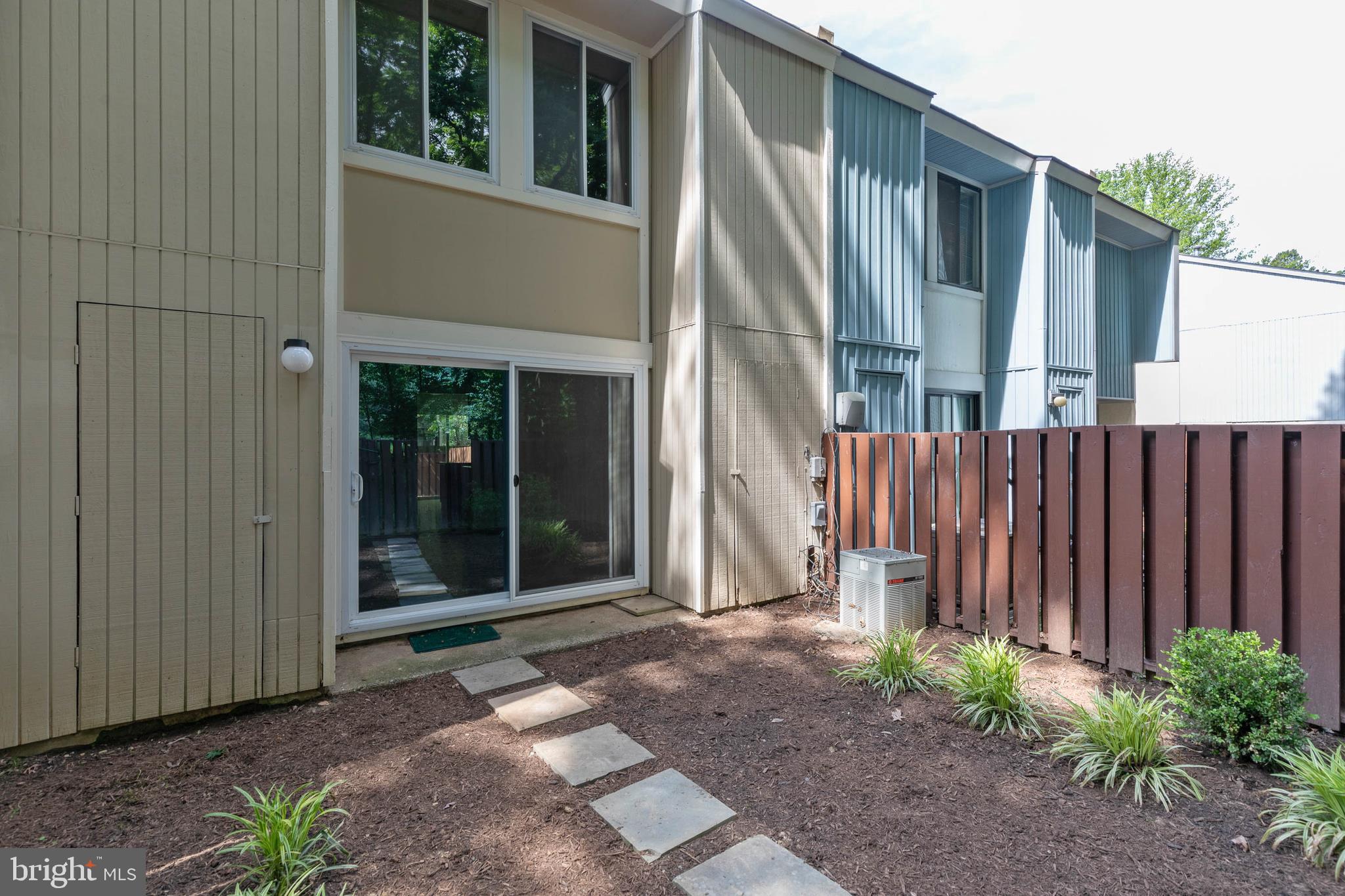 2316 Southgate Square Reston, VA 20191 - Photo 29 of 34 Living Area leads to Fully Fenced Back Yard