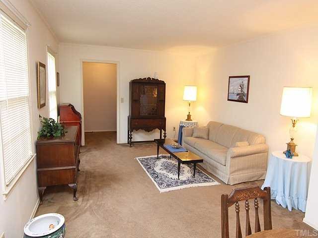 3525 Morningside Drive Raleigh, NC 27607 - Photo 2 of 12 a living room with furniture and a window