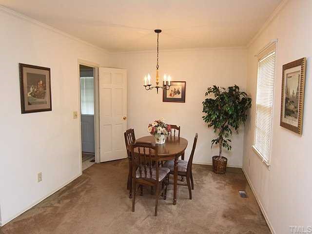 3525 Morningside Drive Raleigh, NC 27607 - Photo 3 of 12 a view of a dining room with furniture and window