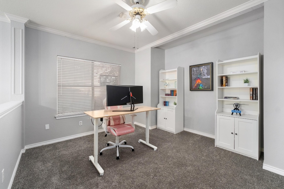 3808 Latimer Drive Austin, TX 78732 - Photo 18 of 31 a view of a workspace with furniture and a window
