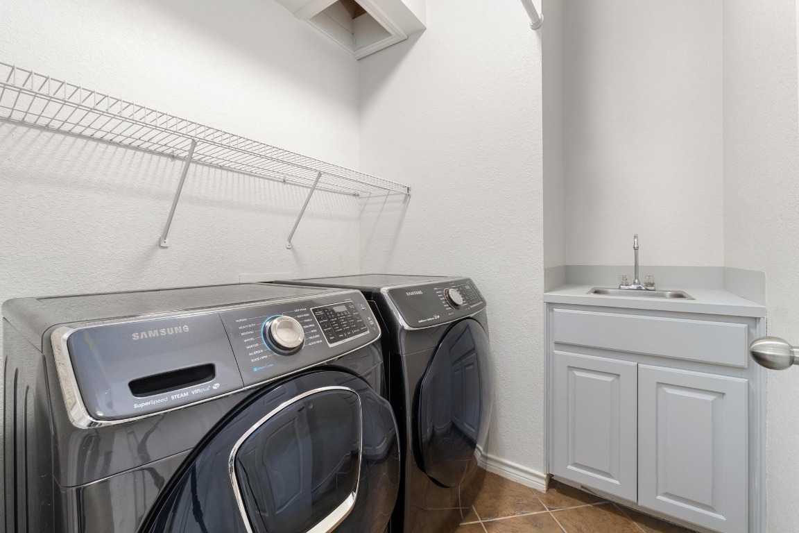 3808 Latimer Drive Austin, TX 78732 - Photo 29 of 31 a utility room with dryer and washer