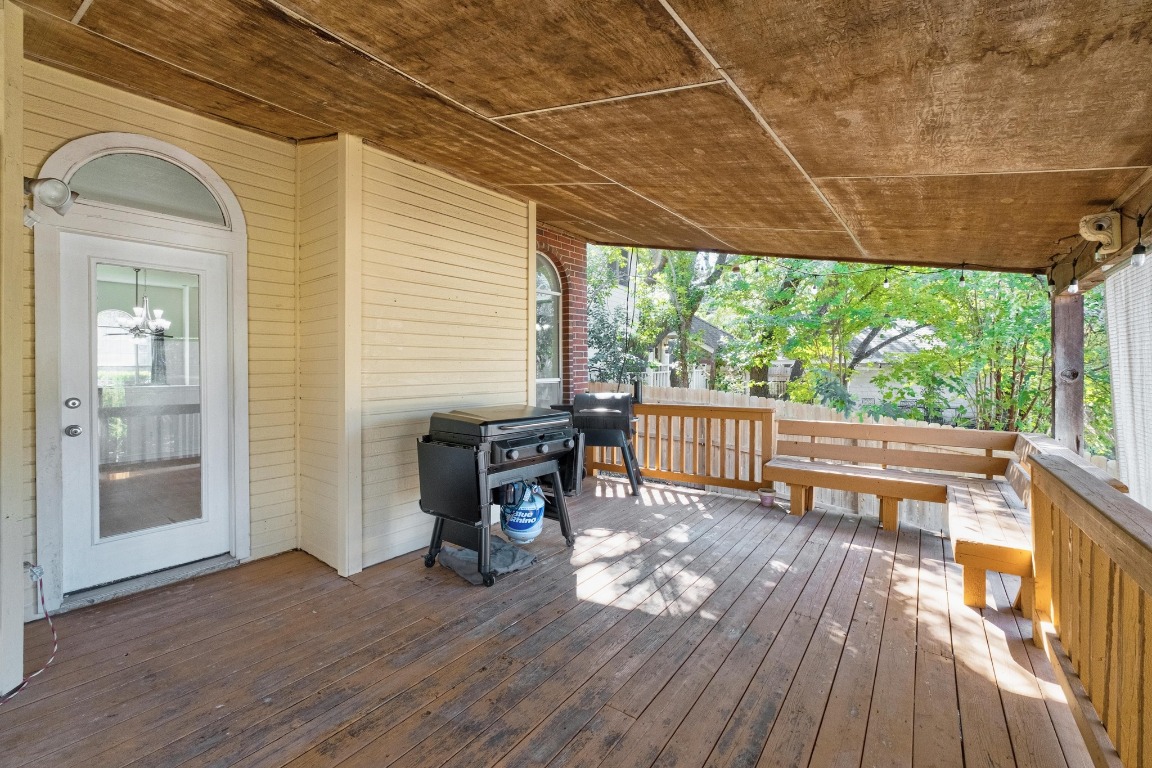 3808 Latimer Drive Austin, TX 78732 - Photo 30 of 31 a view of a deck with wooden floor and outdoor seating
