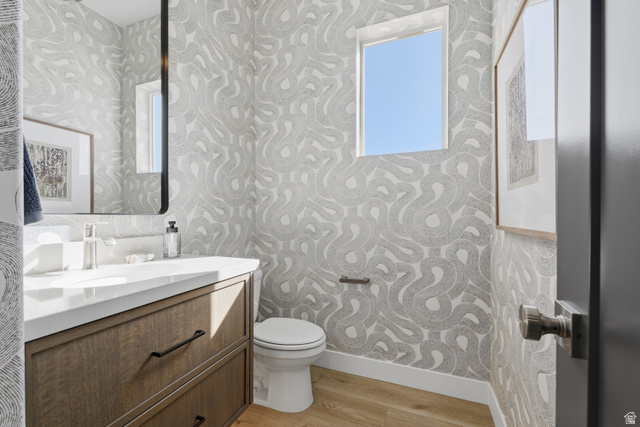 2559 West Aurora Avenue Mapleton, UT 84664 - Photo 24 of 60 Contemporary powder room featuring patterned wallpaper and wood-finish flooring