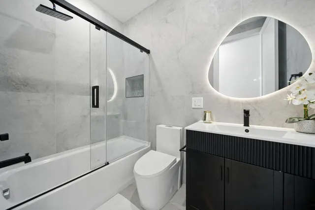 a view of a hallway with washer and dryer