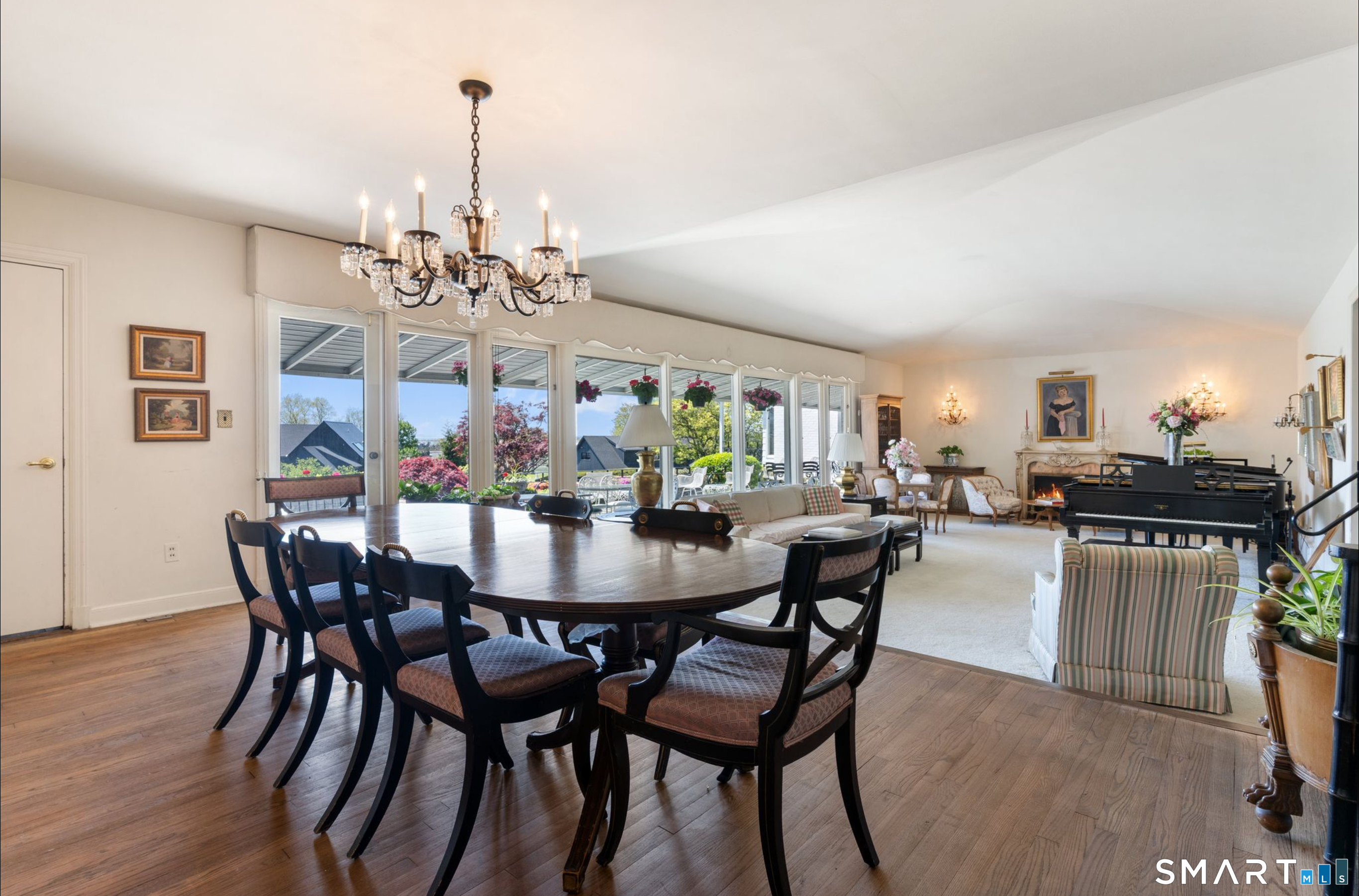 7 Sasqua Road Norwalk, CT 06855 - Photo 8 of 40 a view of a dining room with furniture and chandelier
