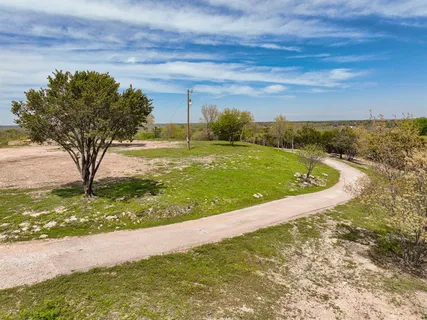 a view of a yard with an trees